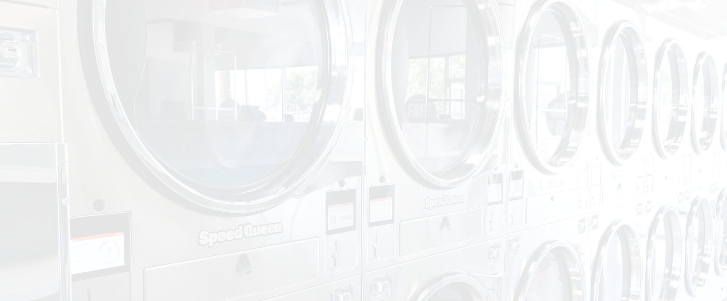 row of speed queen washers